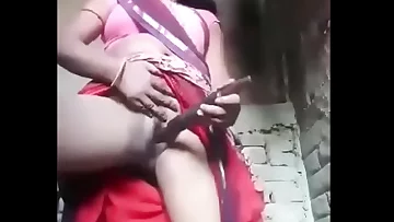 Puri is inserting the bandage into her pussy&period;