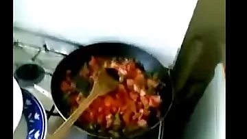 Desi bhabhi sucking while cooking