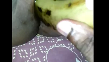 Tamil girl play with banana