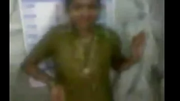 malar aunty giving her breastmilk and smiling at priest of temple