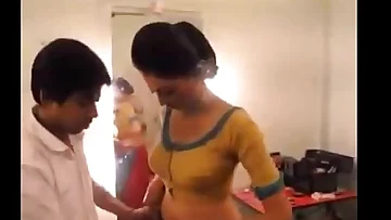 Bangladeshi boy looking something inside.