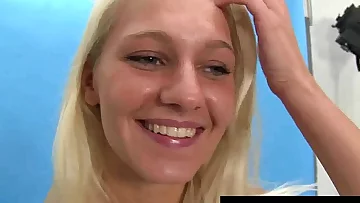 Busty blonde teen Sara posing